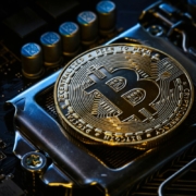 a-bitcoin-on-top-of-a-computer-motherboard-stockpack-unsplash.jpg a bitcoin on top of a computer motherboard