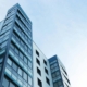 Low angle view of office building against sky