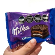 a-hand-holding-a-bag-of-milk-chocolate-sandwich-stockpack-unsplash.jpg a hand holding a bag of milk chocolate sandwich