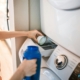 a-person-pouring-detergent-in-a-washing-machine-stockpack-pexels.jpg A person pouring detergent in a washing machine