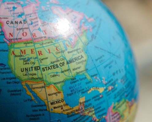 blue-and-brown-desk-globe-stockpack-unsplash.jpg blue and brown desk globe