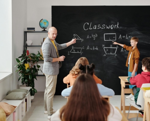 teacher-talking-to-the-class-stockpack-pexels.jpg Teacher talking to the class