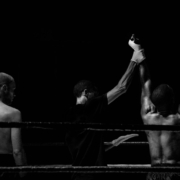 grayscale-photography-of-man-holding-boxer-s-hand-inside-battle-ring-stockpack-pexels.jpg Grayscale photography of man holding boxer s hand inside battle ring
