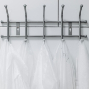 Lab coats hanging on metal hanger