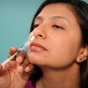 this-2009-image-depicts-a-healthcare-practitioner-as-he-was-administering-the-h1n1-live-attenuated-intranasal-vaccine-laiv-to-an-indian-female-recipient-using-a-small-syringe-he-was-delivering-the-vac-stockpack-unsplash.jpg This 2009 image depicts a healthcare practitioner as he was administering the H1N1 live attenuated intranasal vaccine (LAIV) to an Indian female recipient. Using a small syringe, he was delivering the vaccine mist into the woman’s right nostril. Photographer Jame Gathany