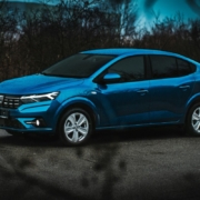 a-blue-car-parked-in-a-parking-lot-stockpack-unsplash.jpg a blue car parked in a parking lot