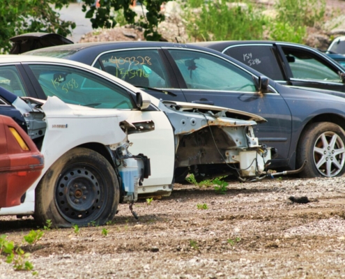 a-bunch-of-cars-that-are-sitting-in-the-dirt-stockpack-unsplash.jpg