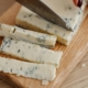 a-person-cutting-gorgonzola-cheese-stockpack-pexels.jpg A person cutting gorgonzola cheese