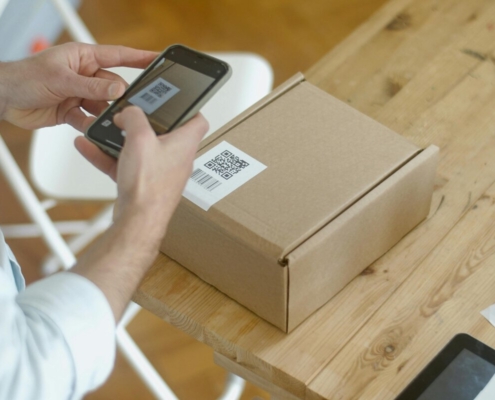 person-taking-photo-of-the-qr-code-stockpack-pexels.jpg Person taking photo of the qr code