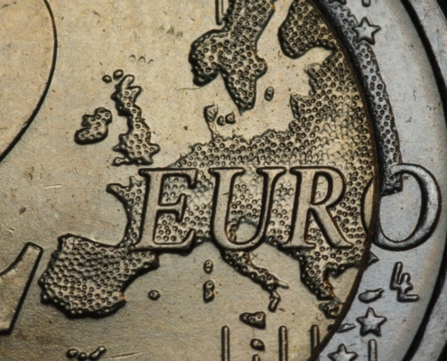 round gold-colored 2 euro coin