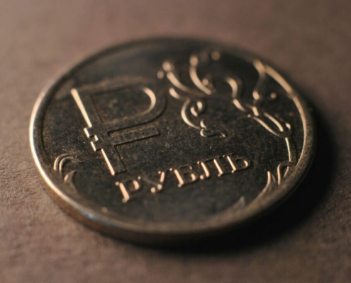 a-close-up-of-a-coin-on-a-table-stockpack-unsplash.jpg
