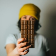 Girl holding chocolate bar