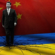 cutout-of-xi-jinping-walking-on-a-cracked-ukrainian-on-a-chinese-flag-background