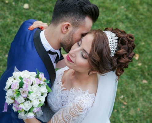Happy couple holding flower