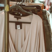 a-rack-of-cloth-on-the-street-stockpack-unsplash.jpg A rack of cloth on the street.