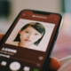 a-person-holding-a-cell-phone-with-a-picture-of-a-woman-on-it-stockpack-unsplash.jpg
