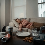 man-sleeping-on-couch-stockpack-unsplash.jpg Man Sleeping on couch
