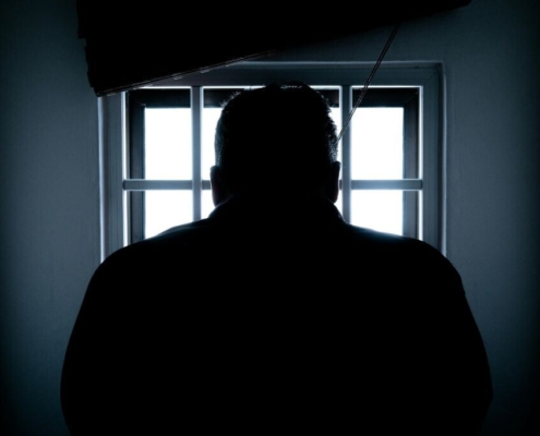 rear-view-of-a-silhouette-man-in-window-stockpack-pexels.jpg Rear view of a silhouette man in window