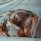 a-baby-in-a-crib-stockpack-unsplash.jpg