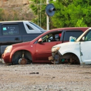 a-couple-of-cars-that-are-sitting-in-the-dirt-stockpack-unsplash.jpg