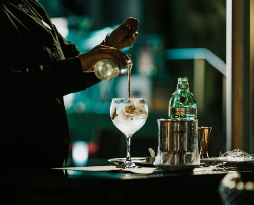 a-person-pouring-a-drink-into-a-glass-stockpack-unsplash.jpg