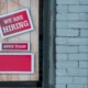 we-are-hiring-sign-in-window-of-brick-building-a-red-and-white-sign-in-a-window-of-a-brick-building-reads-we-are-hiring-with-a-smaller-sign-that-says-apply-today-stockpack-unsplash.jpg "We Are Hiring" Sign in Window of Brick Building - A red and white sign in a window of a brick building reads We Are Hiring with a smaller sign that says Apply Today.