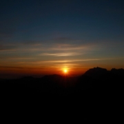 the-sun-is-setting-over-a-mountain-range-stockpack-unsplash.jpg