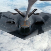 gray-fighter-drone-above-white-clouds-stockpack-pexels.jpg Gray fighter drone above white clouds