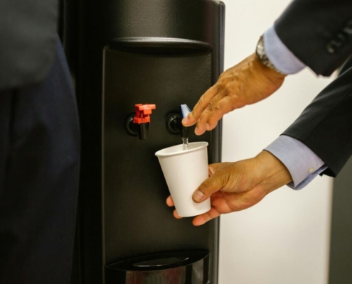 person-pouring-water-on-white-cup-stockpack-pexels.jpg Person pouring water on white cup