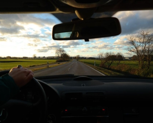 road, trip, car ride, windshield, excursion, exit, driver, rearview mirror, landscape, hand, steering wheel, control, car ride, windshield, windshield, windshield, windshield, windshield, driver, driver, driver, driver, rearview mirror, rearview mirror, rearview mirror, rearview mirror, steering wheel