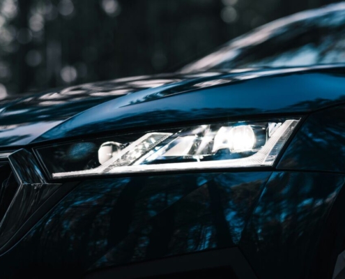 a-close-up-of-a-blue-cars-headlight-stockpack-unsplash.jpg