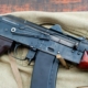 close-up-shot-of-a-black-rifle-stockpack-pexels.jpg Close up shot of a black rifle