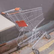 stainless-steel-shopping-cart-on-gray-concrete-floor-stockpack-unsplash.jpg