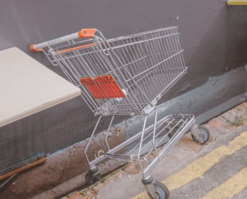 stainless-steel-shopping-cart-on-gray-concrete-floor-stockpack-unsplash.jpg