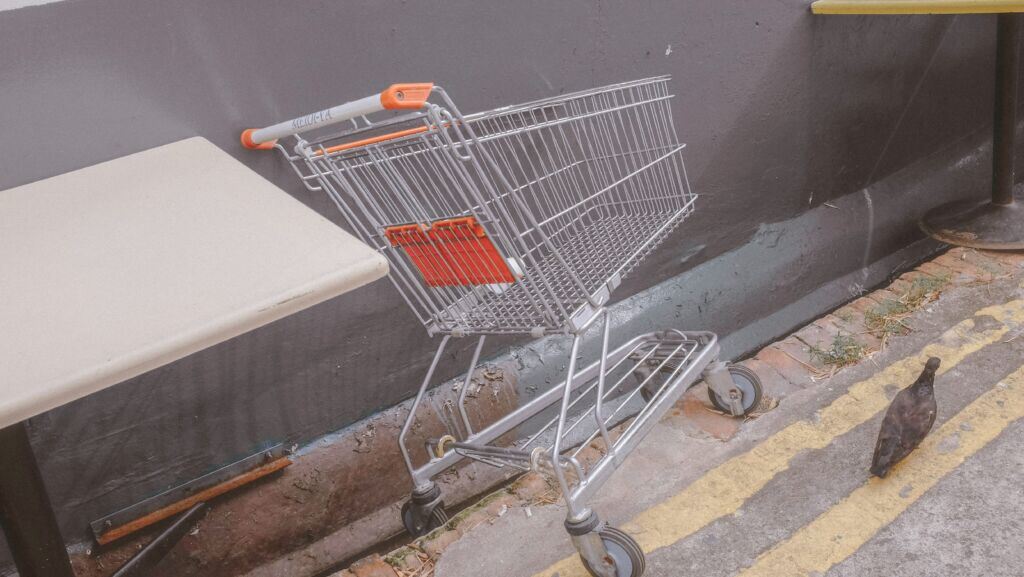 stainless-steel-shopping-cart-on-gray-concrete-floor-stockpack-unsplash.jpg