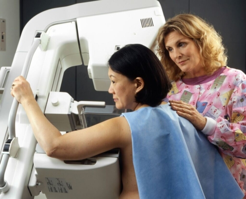 woman-receives-mammogram-a-caucasian-female-technician-positions-an-asian-woman-at-an-imaging-machine-to-receive-a-mammogram-creator-rhoda-baer-stockpack-unsplash.jpg Woman Receives Mammogram.
A Caucasian female technician positions an Asian woman at an imaging machine to receive a mammogram.
Creator: Rhoda Baer