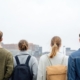 young people, group, young, people, back view, group together, looking, city, together, skyline, urban, cityscape, ai generated