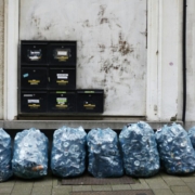 a-bunch-of-bags-sitting-on-the-side-of-a-building-stockpack-unsplash.jpg