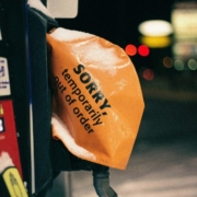 a-close-up-of-a-parking-meter-with-a-bag-on-it-stockpack-unsplash.jpg