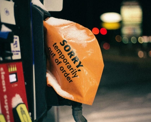 a-close-up-of-a-parking-meter-with-a-bag-on-it-stockpack-unsplash.jpg