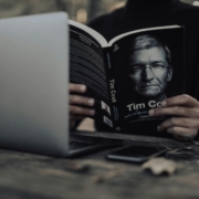 crop-man-with-laptop-reading-book-stockpack-pexels.jpg Crop man with laptop reading book