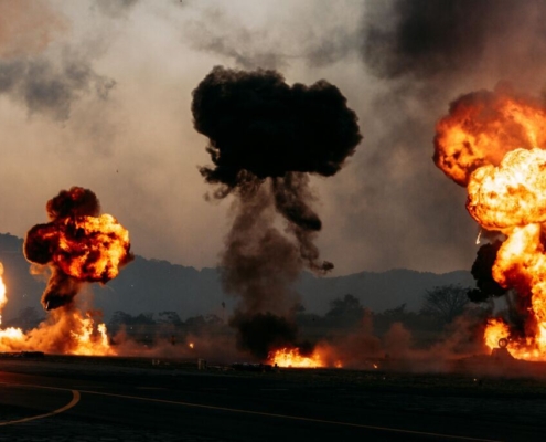 Dramatic fire and explosion scene outdoors
