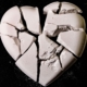 A broken heart made of white gypsum