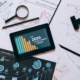 clipboard-with-statistical-data-and-digital-tablet-with-stock-market-display-on-screen-stockpack-pexels.jpg Clipboard with statistical data and digital tablet with stock market display on screen