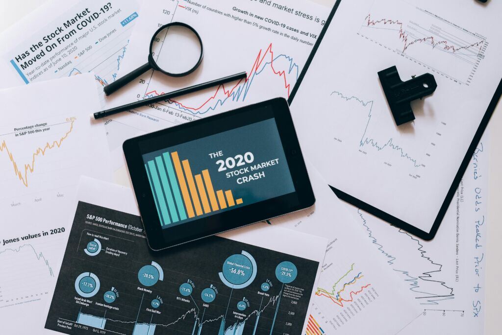 clipboard-with-statistical-data-and-digital-tablet-with-stock-market-display-on-screen-stockpack-pexels.jpg Clipboard with statistical data and digital tablet with stock market display on screen