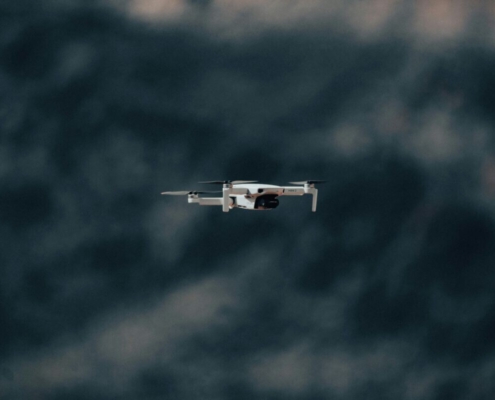 white-and-black-airplane-flying-under-blue-sky-stockpack-unsplash.jpg