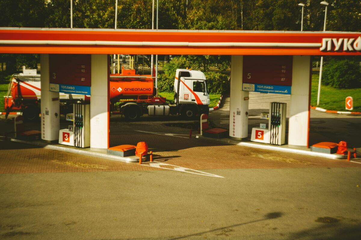 a-couple-of-trucks-are-parked-at-a-gas-station-stockpack-unsplash.jpg